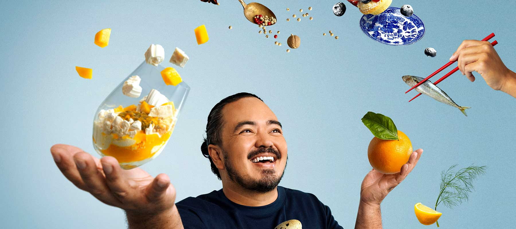 Adam Liaw juggles food. SBS The Cook Up with Adam Liaw (2021).